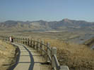 Walking path looking back over dry lake construction